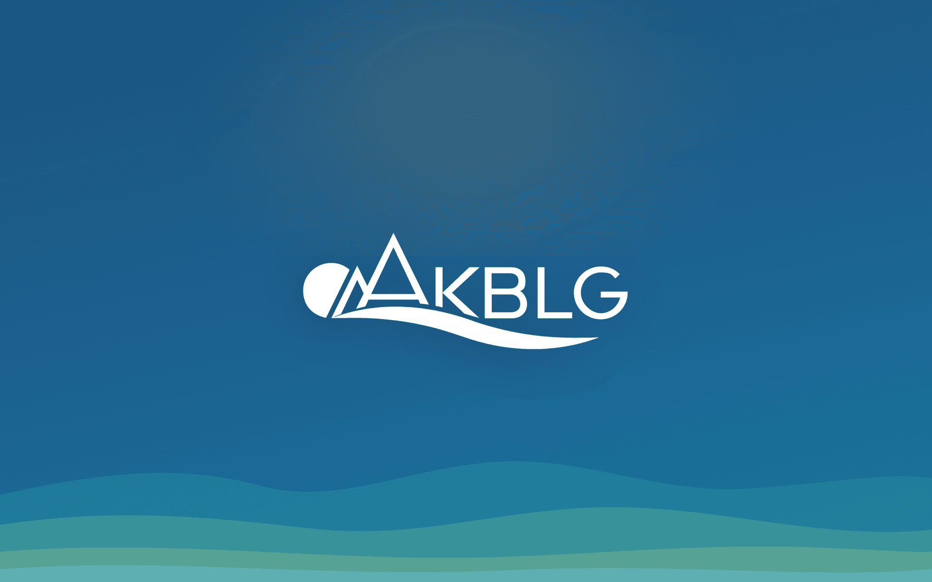 The AKBLG mark over the Kootenay ridges
