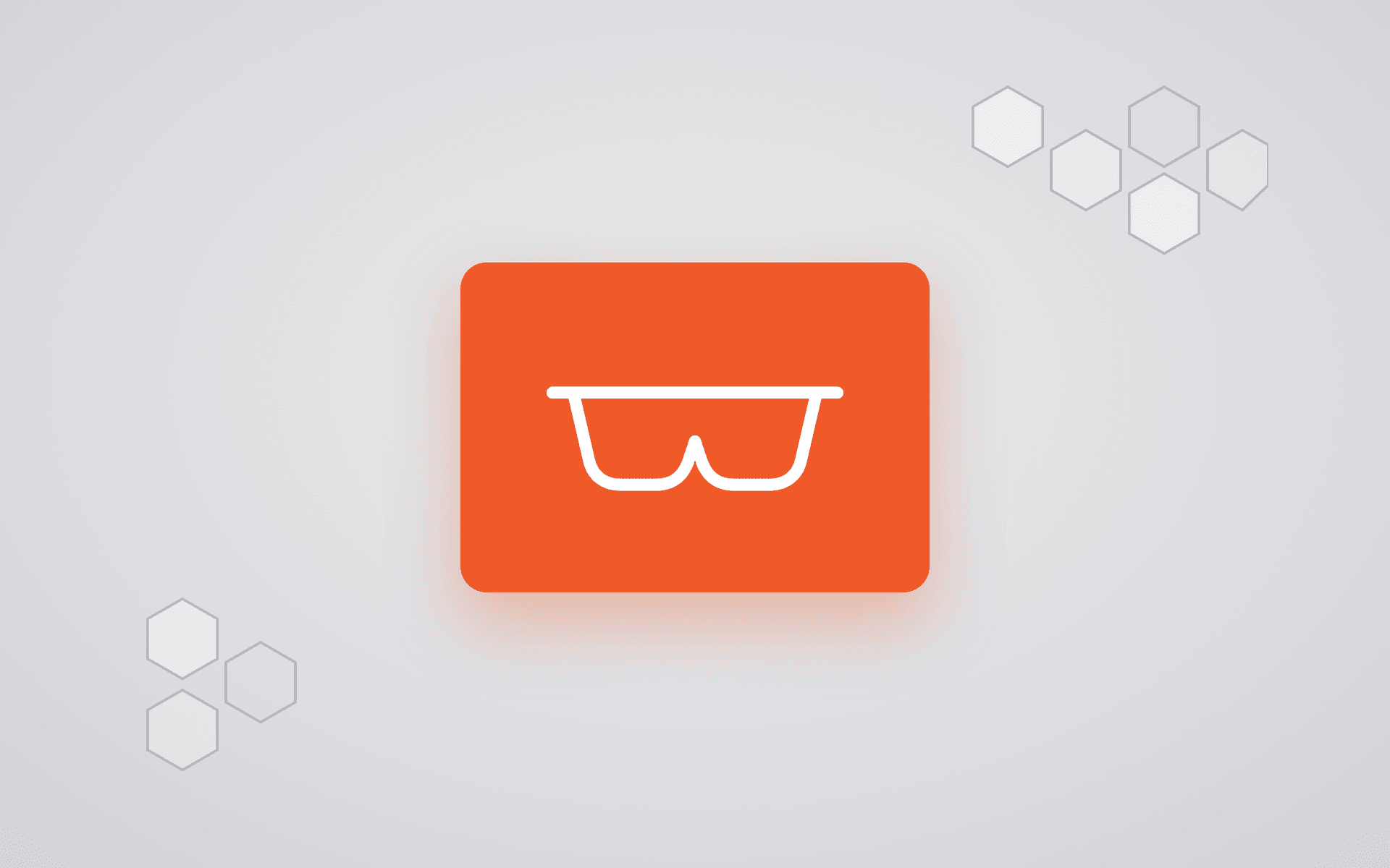 Tilt Five AR glasses glyph on orange with hex motif